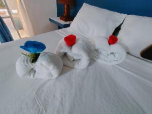 Ein Bett oder Betten in einem Zimmer der Unterkunft House Jardin Del Caribe