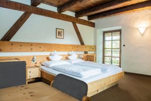 Postel nebo postele na pokoji v ubytování B&B Unterhabsbergerhof