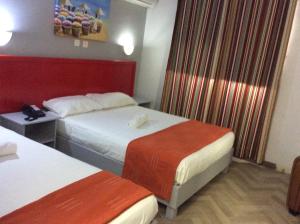 Postelja oz. postelje v sobi nastanitve Champ de Mars B&B