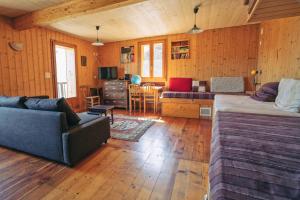 Posezení v ubytování Chalet les Mésanges - Salvan
