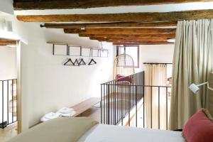 Postel nebo postele na pokoji v ubytování Apartaments la Rambla - Licorella - 4 persones