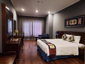 Postel nebo postele na pokoji v ubytování Pistachio Hotel Sapa