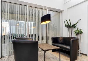 Posezení v ubytování Østergaards Hotel