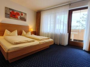 Postel nebo postele na pokoji v ubytování Hotel Restaurant Adler