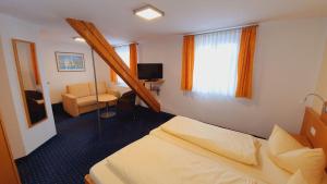 Postel nebo postele na pokoji v ubytování Hotel Restaurant Adler