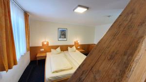 Postel nebo postele na pokoji v ubytování Hotel Restaurant Adler
