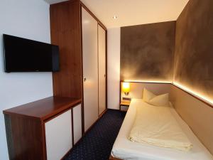 Postel nebo postele na pokoji v ubytování Hotel Restaurant Adler