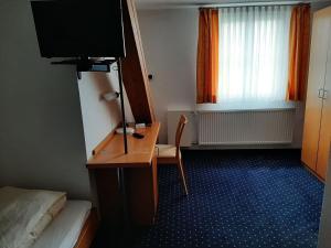 TV a/nebo společenská místnost v ubytování Hotel Restaurant Adler