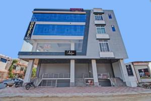 a building with a sign on the front of it at HOTEL IRA Mansarovar Jaipur in Jaipur
