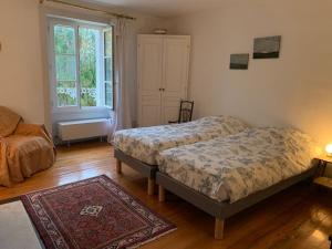 Posteľ alebo postele v izbe v ubytovaní Le Clos- Le Pavillon