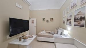 TV a/nebo společenská místnost v ubytování B & B INFINITY