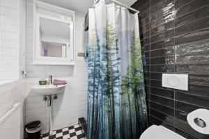 Koupelna v ubytování Acco Guesthouse