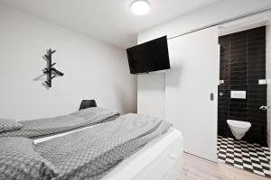 Postel nebo postele na pokoji v ubytování Acco Guesthouse