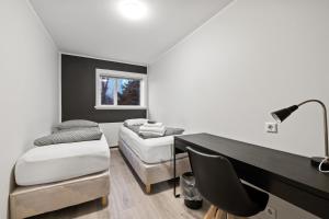 Postel nebo postele na pokoji v ubytování Acco Guesthouse