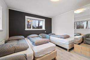 Postel nebo postele na pokoji v ubytování Acco Guesthouse