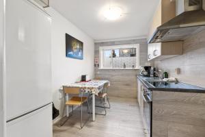 Kuchyň nebo kuchyňský kout v ubytování Acco Guesthouse