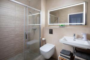 A bathroom at Apartmán Holia, Kubínska Hoľa Még 37 kép