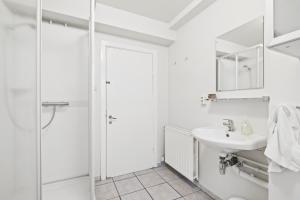 Koupelna v ubytování Acco Guesthouse