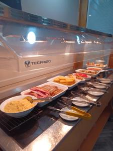 a buffet line with many different types of food at Red Lion Hotel in Basingstoke