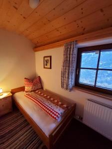 Postel nebo postele na pokoji v ubytování Waschhütte, Ferienhaus
