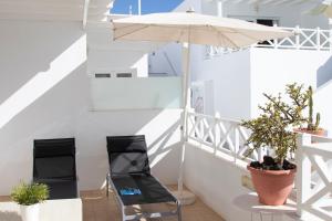 Balkón nebo terasa v ubytování Flower Beach Suite 15