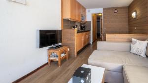 TV a/nebo společenská místnost v ubytování Grand Morillon-309 Appart vue pistes- 5 pers