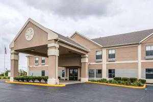 a large office building with a parking lot at Days Inn by Wyndham Kentland in Kentland