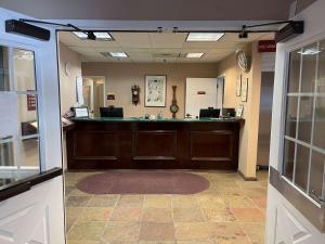 a waiting room with a counter in a hospital at SureStay Hotel by Best Western Eureka in Eureka