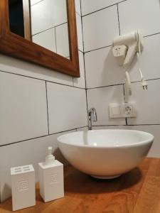 Koupelna v ubytování Sano House