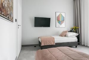 Posteľ alebo postele v izbe v ubytovaní Old Town Residence Aparthotel + 18 fotografií