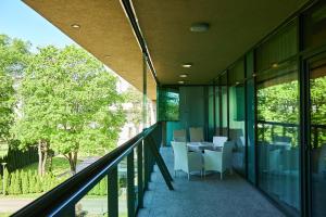 Balkón nebo terasa v ubytování Grand SPA Lietuva Serviced Apartments Dzūkija