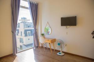 TV a/nebo společenská místnost v ubytování Duy Thanh hotel
