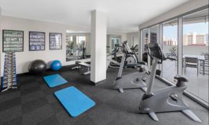 a gym with several treadmills and exercise bikes at Rosie's at Darwin in Darwin