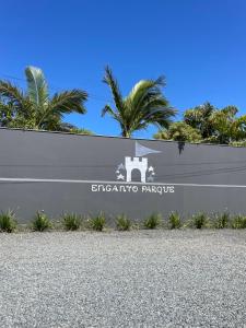a sign for the entrance to the argento parrotunta at Encanto Parque Pousada in Penha