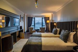 Postel nebo postele na pokoji v ubytování A11 HOTEL BOSPHORUS + 37 fotografií