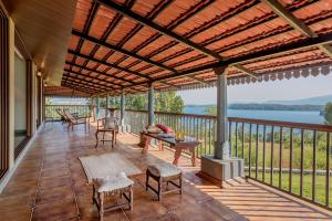 SaffronStays Anantham, Kamshet - pet-friendly lakefront villa with a huge verandah