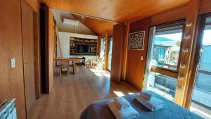 Posezení v ubytování Departamento 3 ambientes súper cálido, en el centro de SMA. 19V4