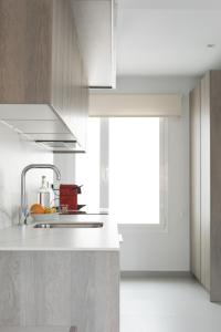 A kitchen or kitchenette at Apartamentos Las Torres