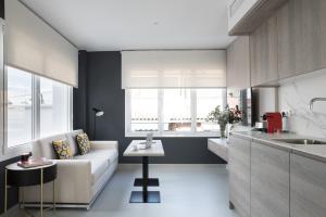 A kitchen or kitchenette at Apartamentos Las Torres
