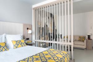 A bed or beds in a room at Apartamentos Las Torres