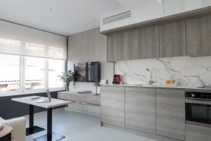 A kitchen or kitchenette at Apartamentos Las Torres