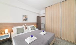 Posteľ alebo postele v izbe v ubytovaní Cretan Sunset Villa Heated Pool