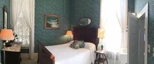 Ein Bett oder Betten in einem Zimmer der Unterkunft Franklin Terrace Bed and Breakfast