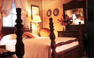 Ein Bett oder Betten in einem Zimmer der Unterkunft Franklin Terrace Bed and Breakfast