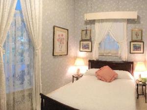 Ein Bett oder Betten in einem Zimmer der Unterkunft Franklin Terrace Bed and Breakfast