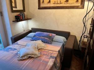 Кровать или кровати в номере SALOTTO SUL MARE