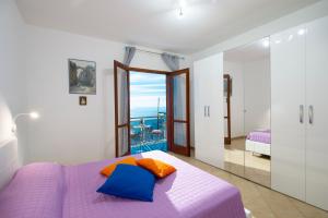 A bed or beds in a room at Domus Lavinia