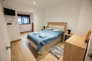 Postel nebo postele na pokoji v ubytování Apartament AVALO + 27 fotografií