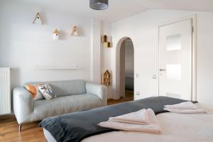 Letto o letti in una camera di Vive Diem