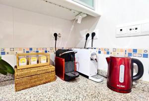 Kuchyň nebo kuchyňský kout v ubytování Oasis Beach Mascarat